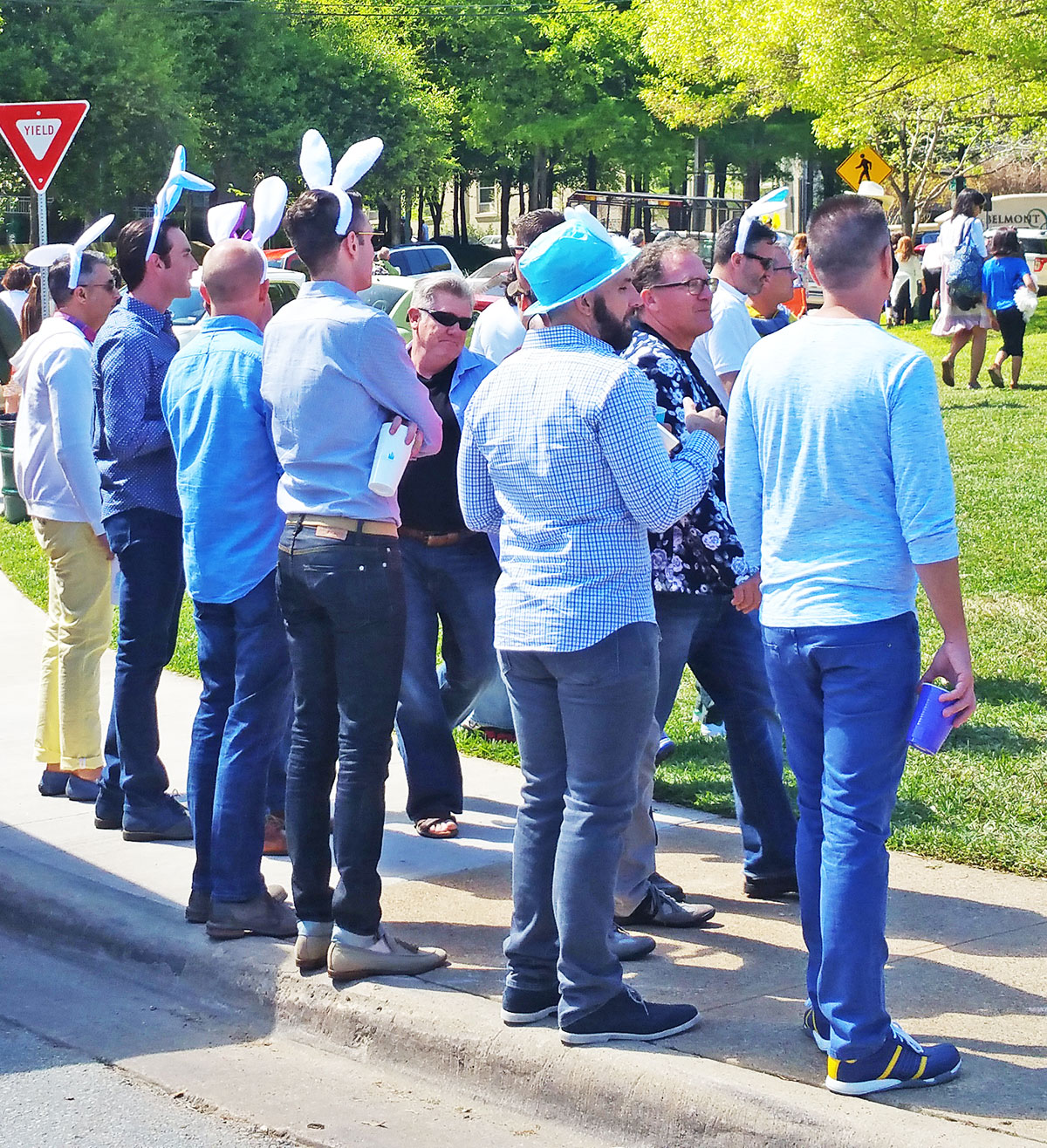 Guys with matching outfits and bunny ears at Easter in Lee Park