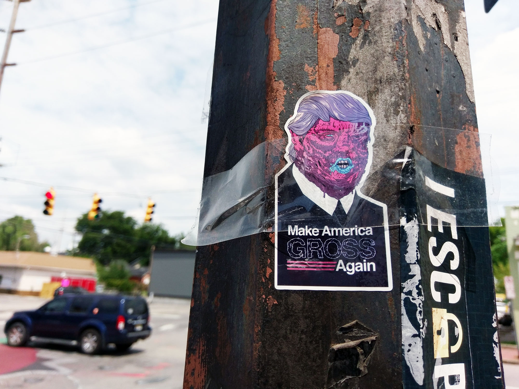 A rude Donald Trump street art sticker in Nashville.