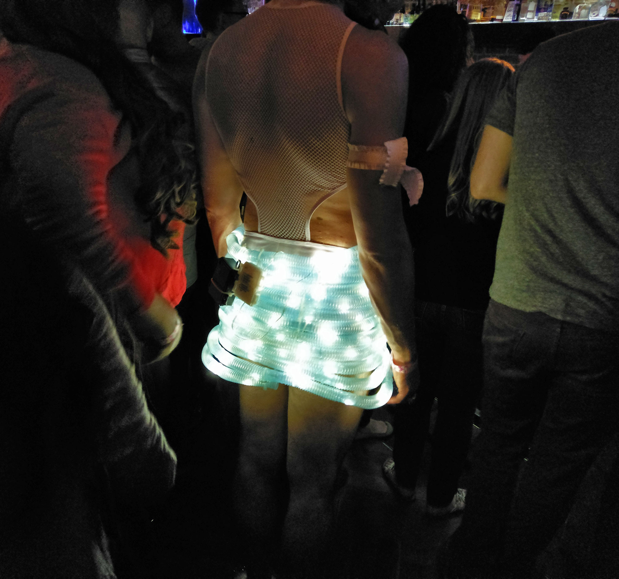 A Washington High Heel Race contestant at Number Nine nightclub after the race (with light-up shirt).