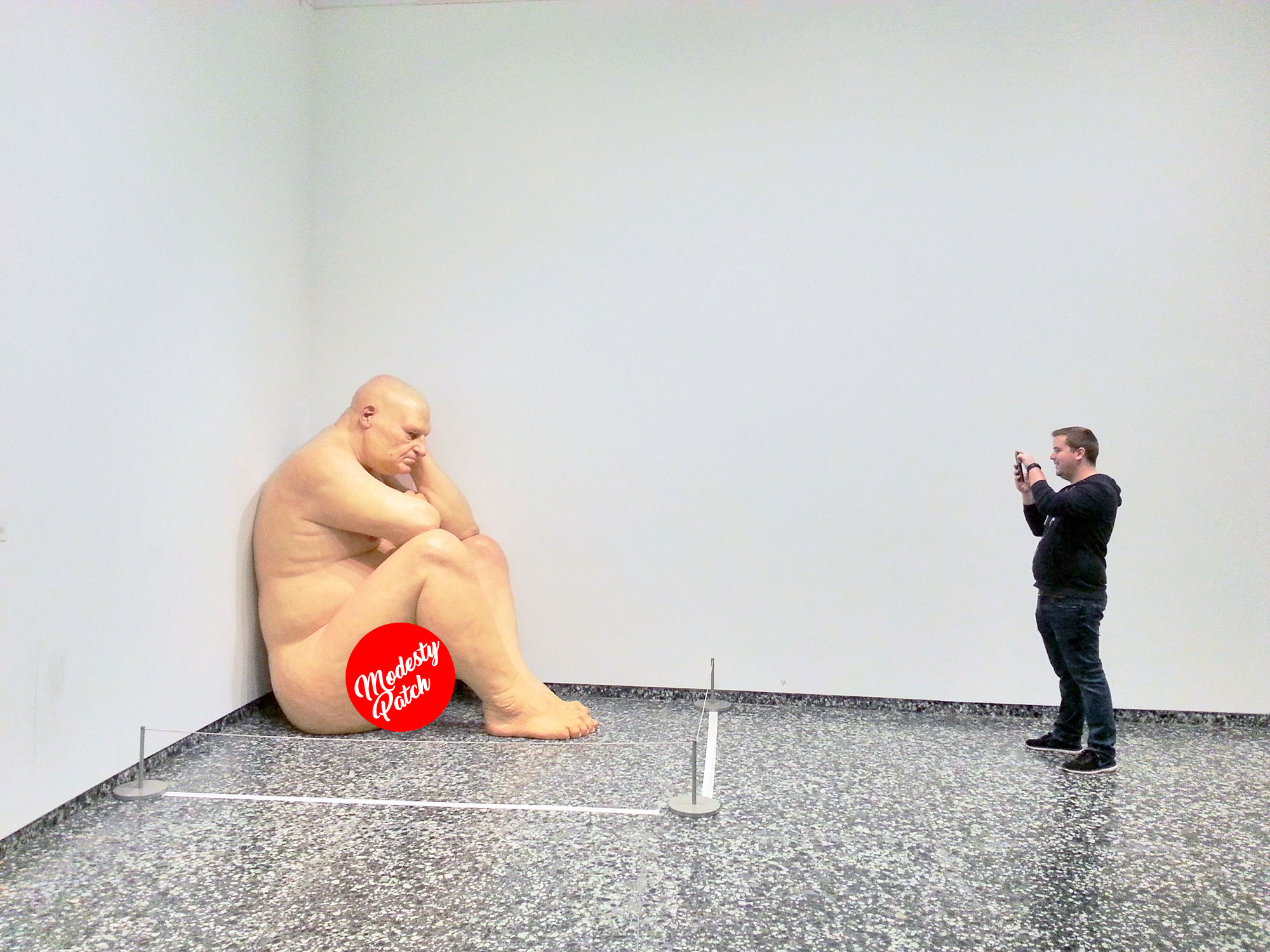 Ron Mueck's "Big Man" sculpture at the Hirshhorn Museum and Sculpture Garden in Washington D.C.